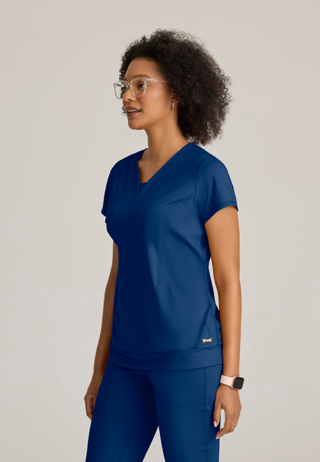 Grey's Anatomy™ Knit Stretch Women's Curved V-Neck Hidden-Seam Pocket Motivate Knit Top