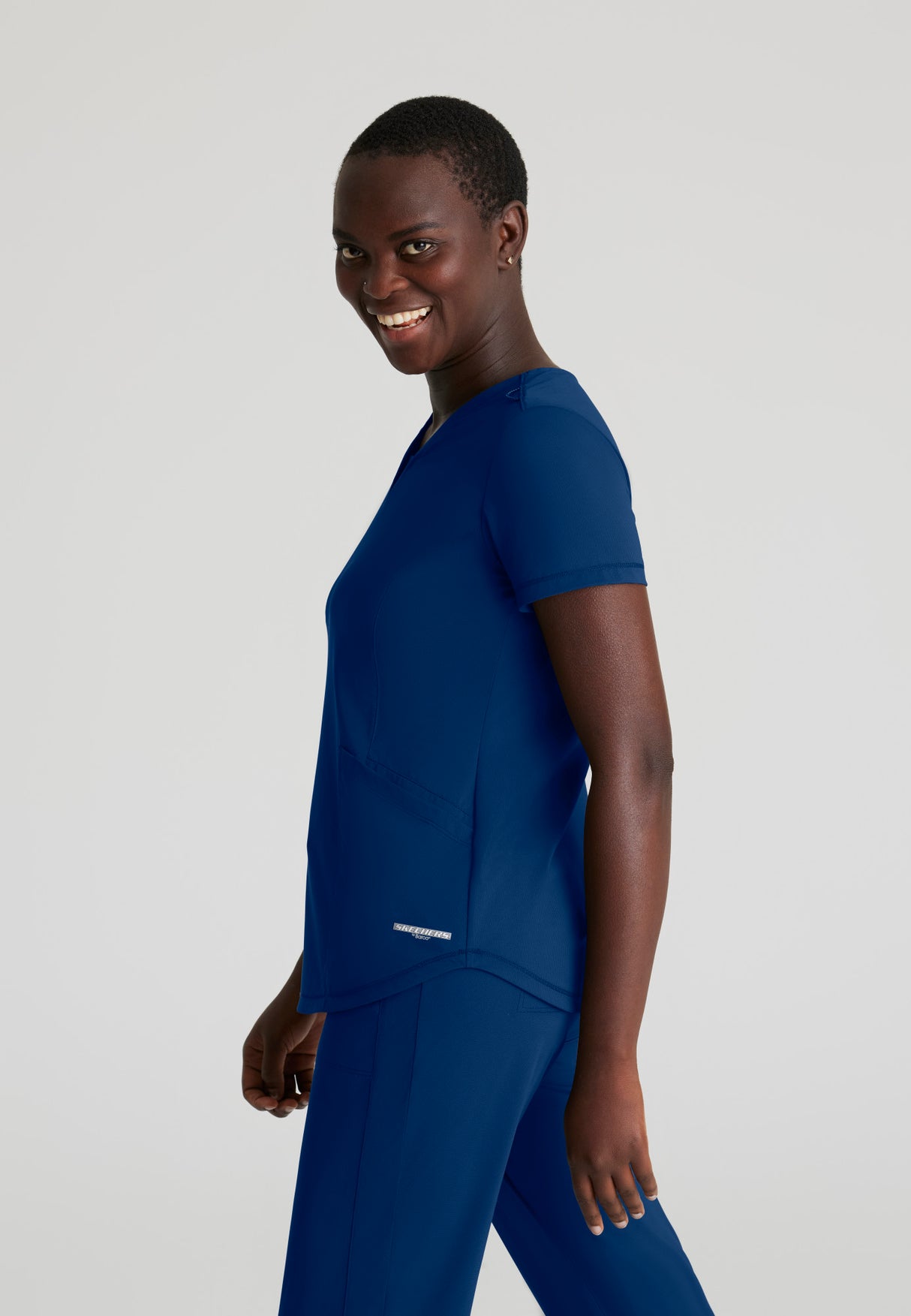 Skechers™ by Barco Slip-ins Women's 3-Pocket Serene Knit Top