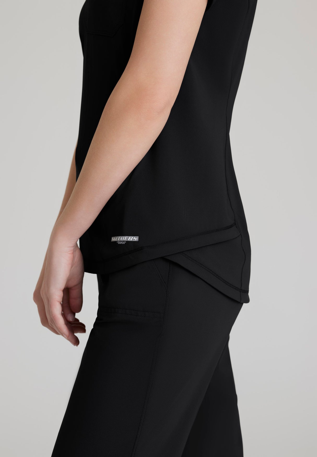 Skechers™ by Barco Slip-ins Women's 1-Pocket Flow Knit Top