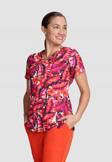 koi™ Next Gen Women's Early Energy 2-Pocket Scrub Print Top - Tropical Dreams