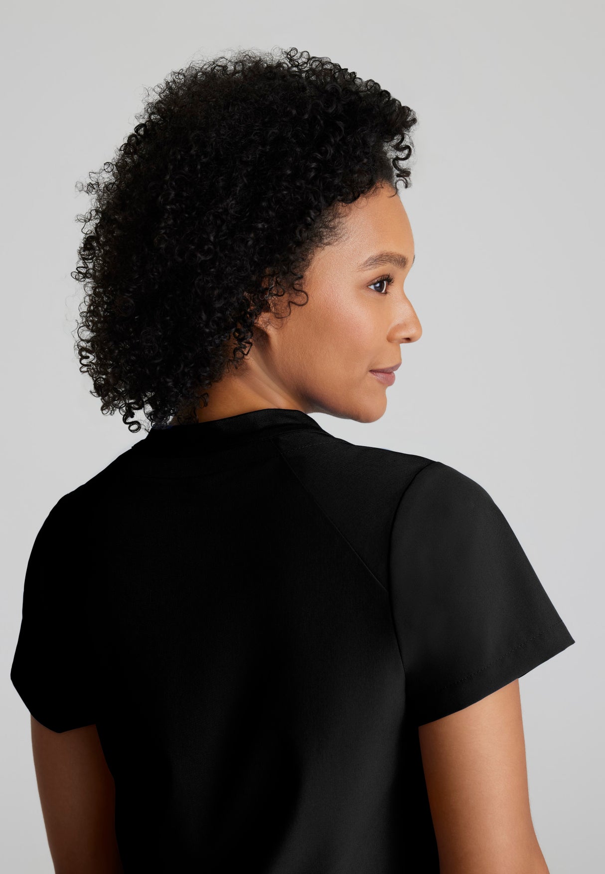 Barco One Women's Flux 2-Pocket Banded Zip Collar Top