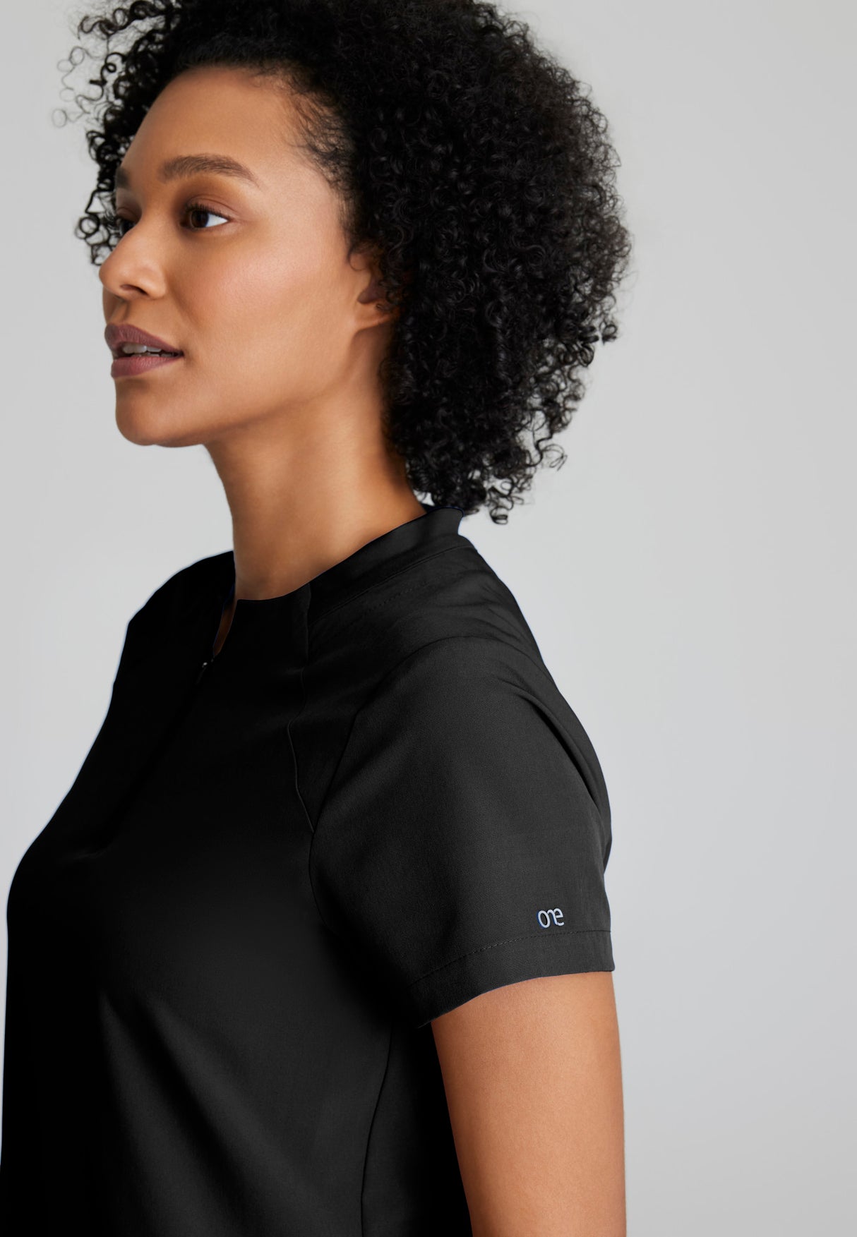 Barco One Women's Flux 2-Pocket Banded Zip Collar Top