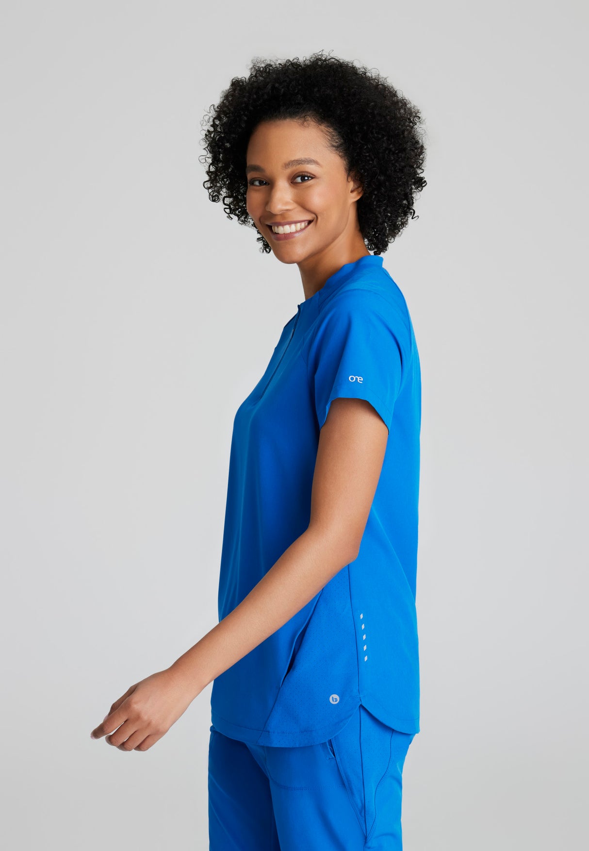 Barco One Women's Flux 2-Pocket Banded Zip Collar Top