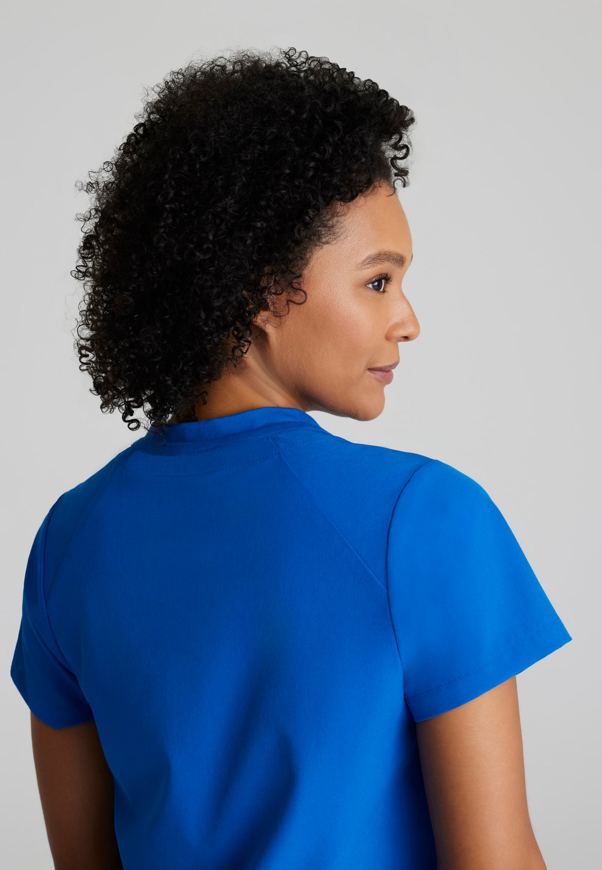 Barco One Women's Flux 2-Pocket Banded Zip Collar Top