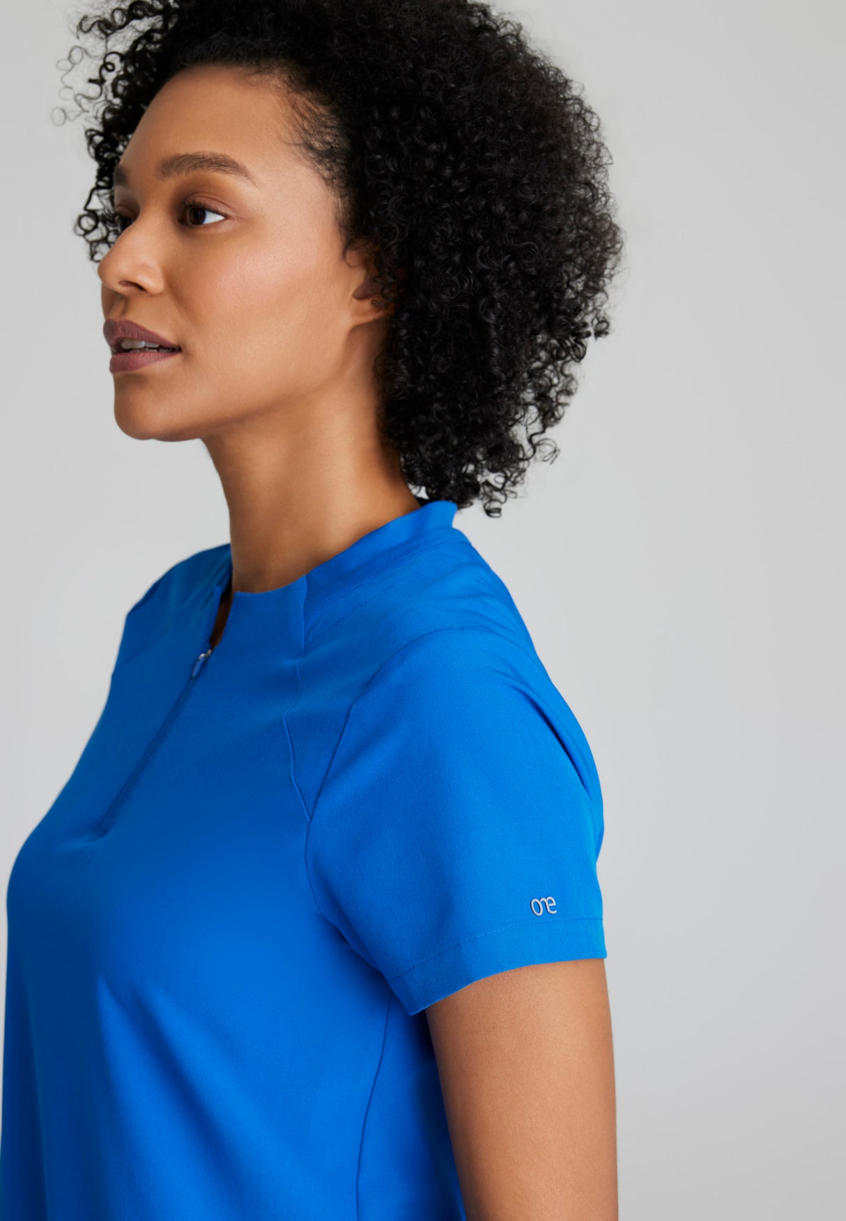 Barco One Women's Flux 2-Pocket Banded Zip Collar Top