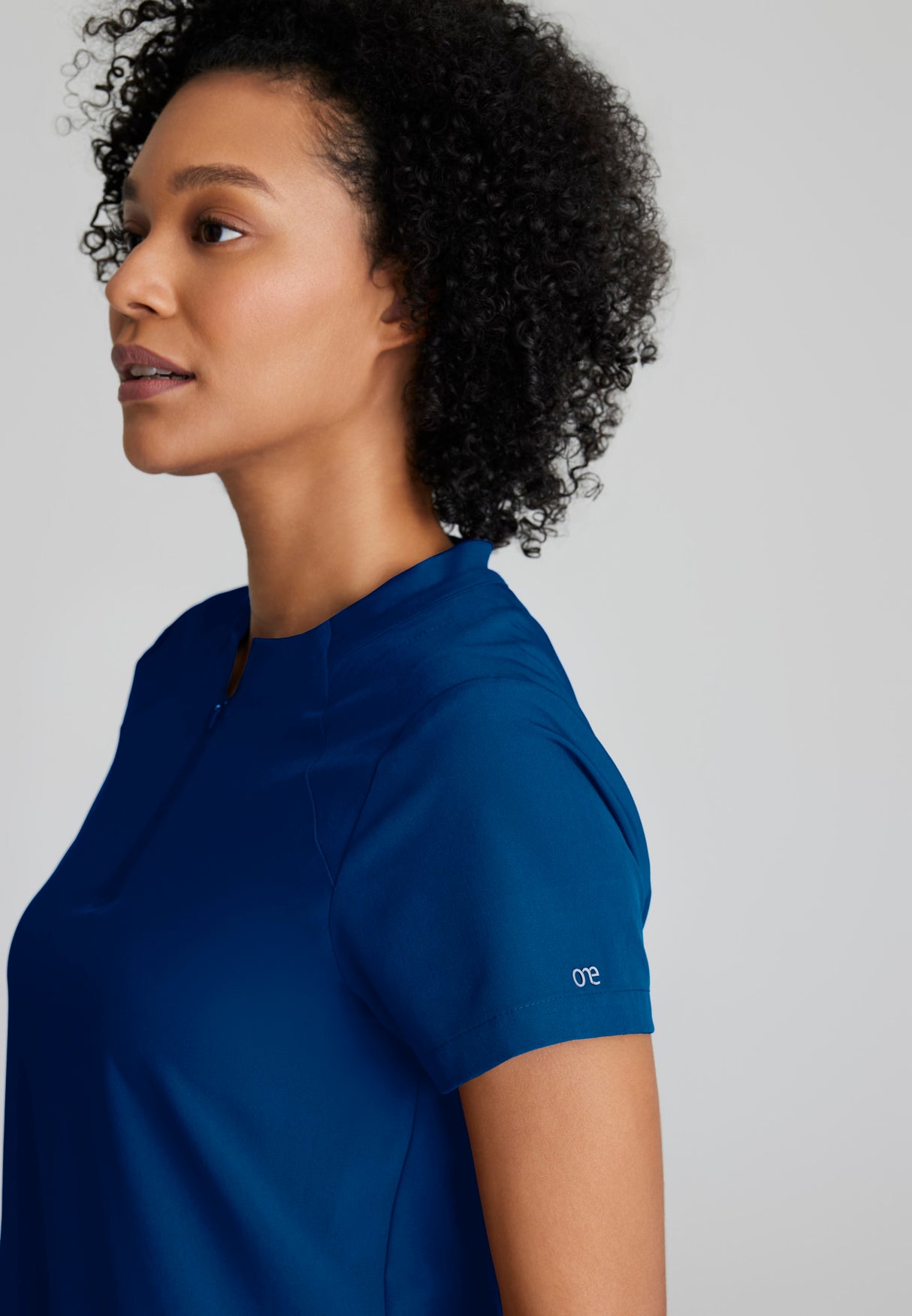 Barco One Women's Flux 2-Pocket Banded Zip Collar Top