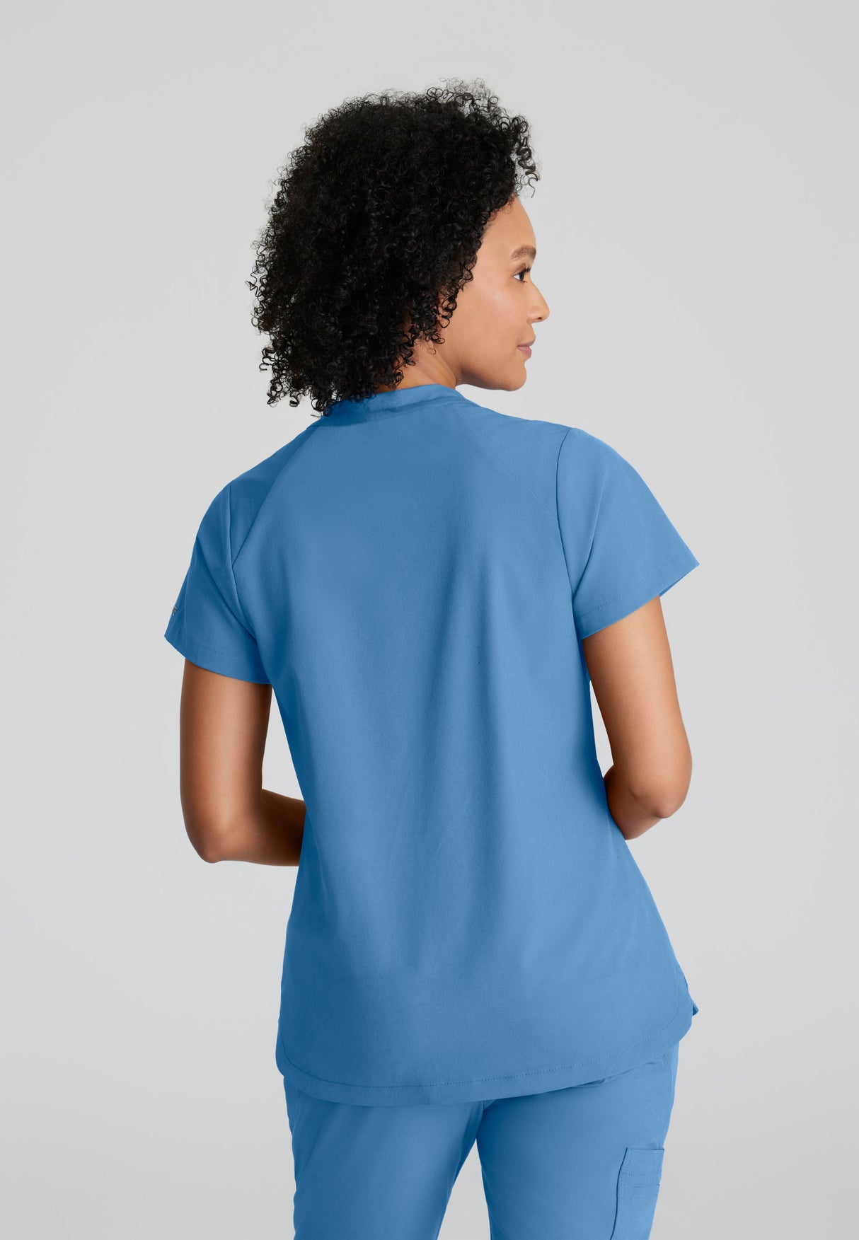 Barco One Women's Flux 2-Pocket Banded Zip Collar Top