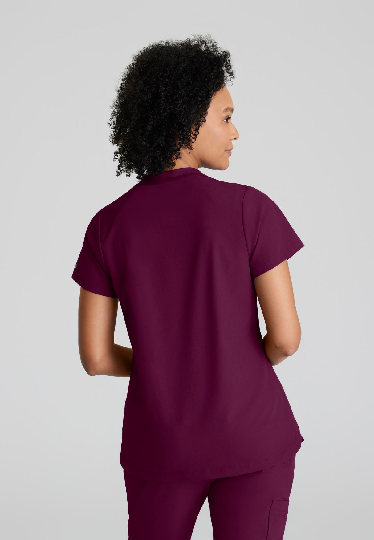 Barco One Women's Flux 2-Pocket Banded Zip Collar Top