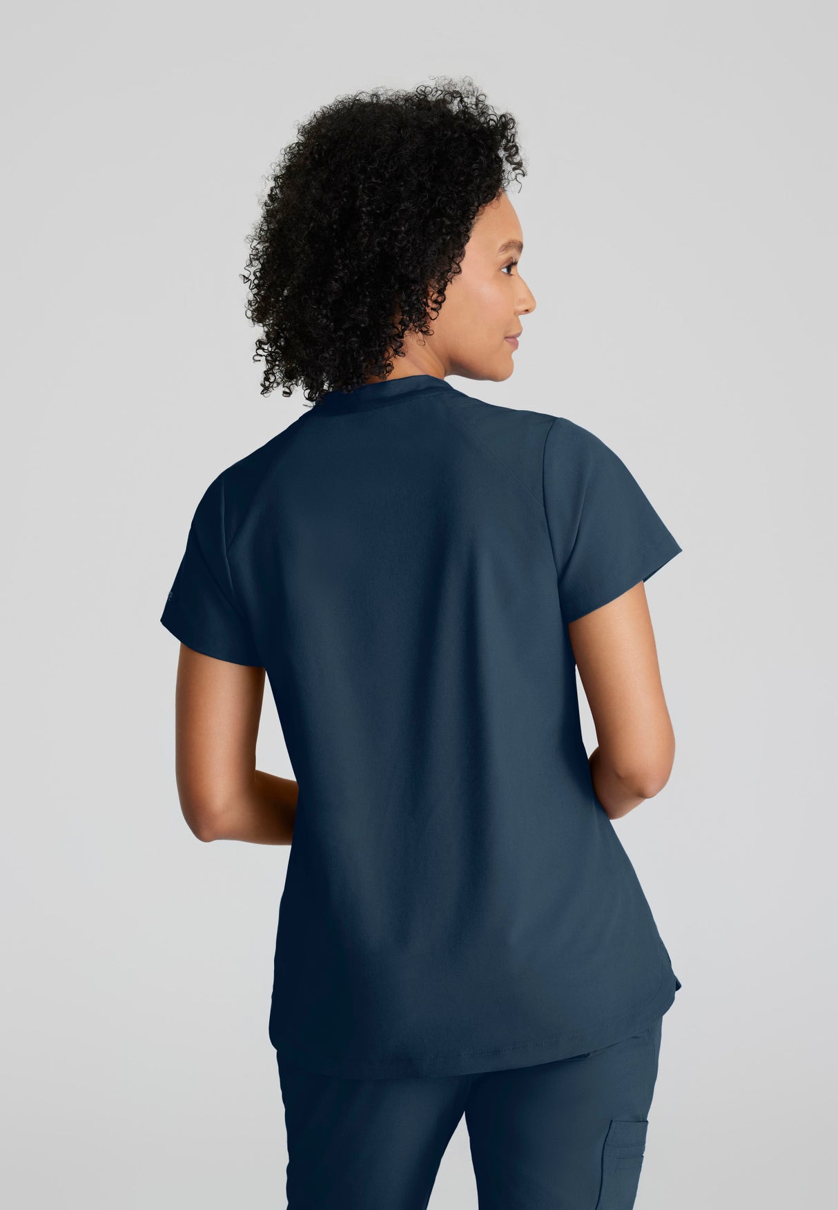 Barco One Women's Flux 2-Pocket Banded Zip Collar Top