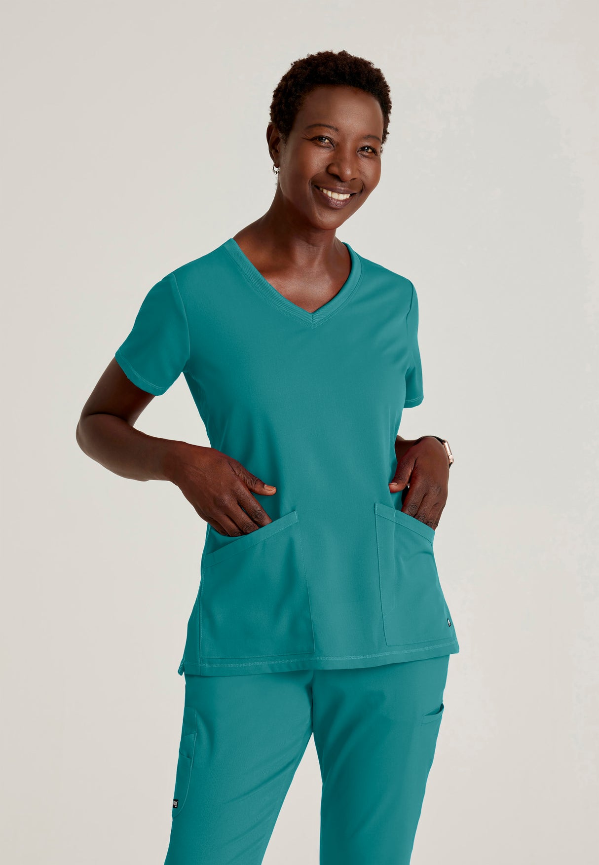 Grey's Anatomy™ Spandex Stretch Women's Serena 3-Pocket Curved V-Neck Scrub Top