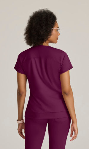 Grey's Anatomy™ Knit Stretch Women's Curved V-Neck Hidden-Seam Pocket Motivate Knit Top