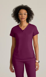 Grey's Anatomy™ Knit Stretch Women's Curved V-Neck Hidden-Seam Pocket Motivate Knit Top